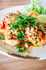 Fried spicy basil leaft with Century egg and pork