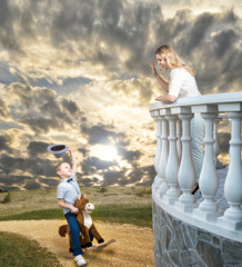 Son rode on horseback to his beloved mother.Little Prince on horseback.