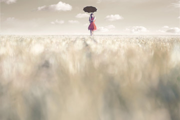 woman shelters from the sun with her umbrella in a surreal place