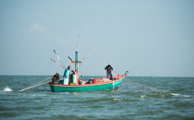 Phang-Nga, Thailand - October 31, 2015  Fishermen on boat fishing at sea in Phang-Nga, Thailand