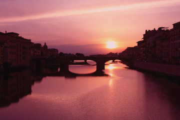 Firenze Florence sunset at Arno river with bridges 
