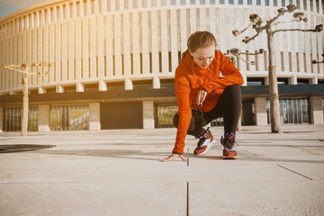 Preparing to run young woman