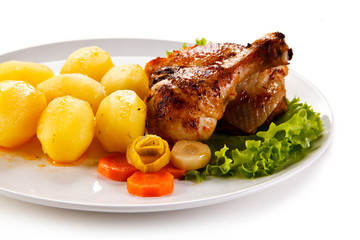 Roast chicken leg with potatoes