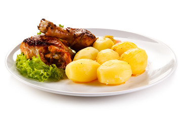 Roast chicken leg with potatoes