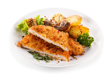 Fried pork chop with potatoes