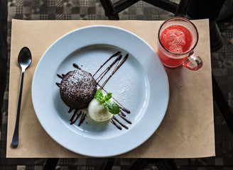 Dessert fondant with strawberry tea