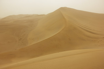 Fototapeta na wymiar Sand dunes in Dunhuang, Gansu province ,China