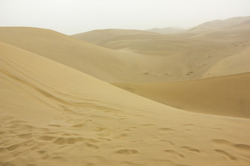 Fototapeta na wymiar Sand dunes in Dunhuang, Gansu,China