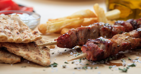 Grilled meat skewers on a table