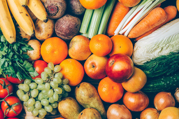 Different fruits and vegetables background