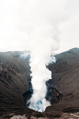 Fototapeta premium Crater of Bromo volcano in Bromo Tengger Semeru National Park, East Java, Indonesia. Erupting and active volcano