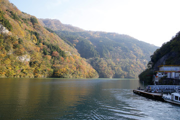 River and autumn leaves and mountains