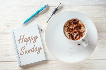 Sketchpad and a cup of hot cocoa