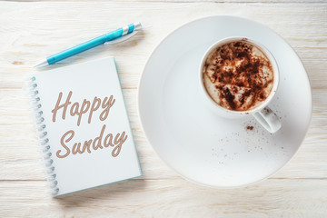 Sketchpad and a cup of hot cocoa