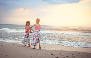 Friends have fun on the beach