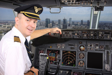 Captain of the plane fly over the big city of Warsaw © ambrozinio