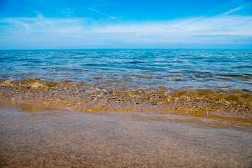 calm waves lapping sand