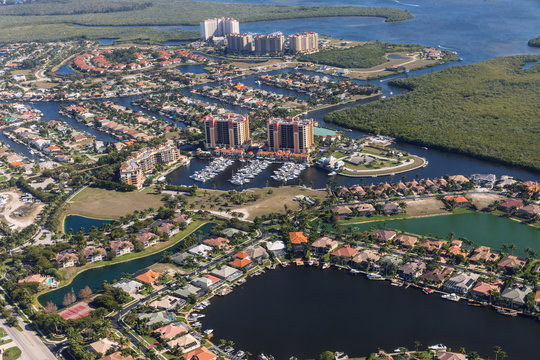 Aerial view of city and gulf Cape Coral, Florida. The Westin Cape Coral Resort at Marina Village