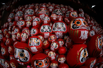 daruma or red-painted good-luck doll in Japan