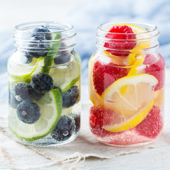 Lemon lime berries fresh infused water detox drink cocktail lemonade