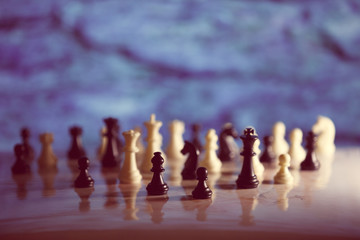 Chess strategy concept is on the bright background