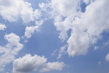 Naklejka na ściany i meble Blue sky with white clouds background in cloudy day