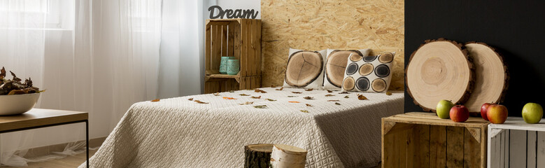 Minimalist bedroom with pillows and DIY cabinets