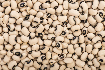 Fototapeta na wymiar Dried black eyed peas texture background