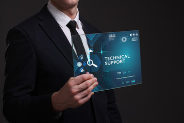 Business, Technology, Internet and network concept. Young businessman working on a virtual screen of the future and sees the inscription: Technical support