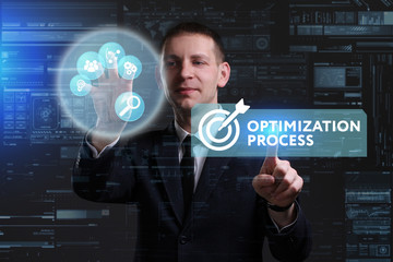 Business, Technology, Internet and network concept. Young businessman working on a virtual screen of the future and sees the inscription: Optimization process
