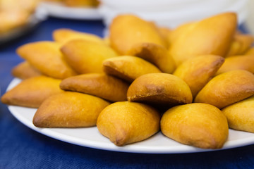 Small pies lie on a plate