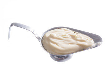 Homemade mayonnaise in a gravy boat