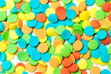 Fototapeta na wymiar Sweet color candy - colorful sprinkles candies background.