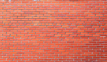 Fototapeta na wymiar The texture of the brick wall is brown