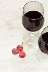 Glasses of red wine at tasting with copyspace