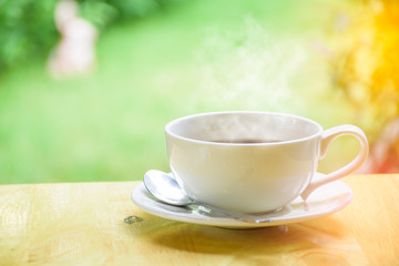 Morning coffee cup on wood table