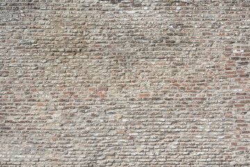 Old rustic brick wall background texture