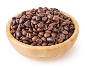 Roasted coffee beans in wooden bowl isolated on white background