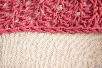 Double color combination - burgundy and beige knitting wool texture as abstract background