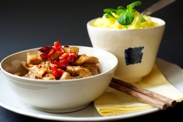 Spicy turkey meat, saffron rice, asian food.