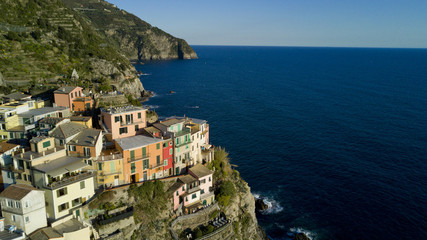 Aerial video footage with drone on Manarola , one of the famous Cinqueterre country, small village with colored houses on the cliff over the sea