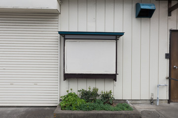 Large blank billboard on a street wall, banners with room to add your own text