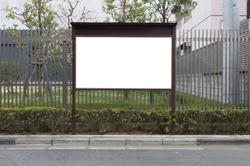 Fototapeta premium Large blank billboard on a street wall, banners with room to add your own text