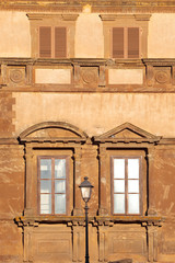 Fototapeta na wymiar Beautiful Tuscany, Detail of Palazzo Campana facade in renaissance style, Colle Val d'Elsa, Siena district