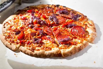 Red pepper, pepperoni and caramelised onion pizza 