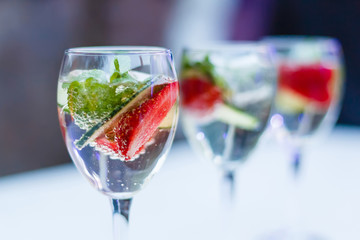 Sparkling water with mint, raspberries and blueberries