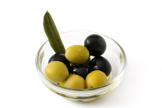 Black and green olives isolated on white background

