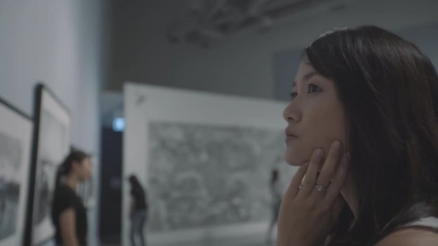 woman visiting art gallery