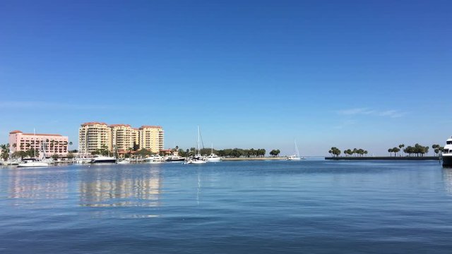 Sailboats, yachts and motorboats are anchored in the central yacht basin in St. Petersburg, Florida, USA.