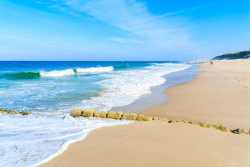 Sea waves on white sand beautiful beach near Kampen village, Sylt island, Germany